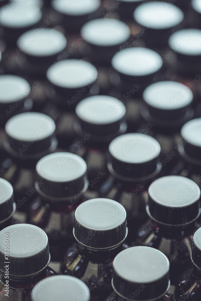 Black plastic bottle and cap Black plastic bottle and cap