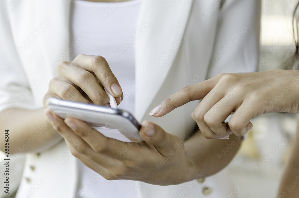 women using tablet with stylus pen