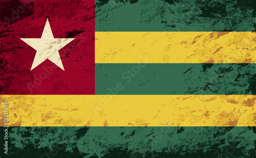 Togolese flag. Grunge background. Vector illustration