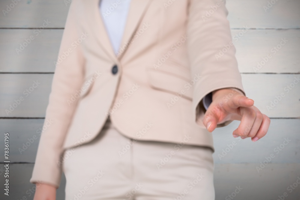 Composite image of businesswoman pointing Composite image of businesswoman pointing