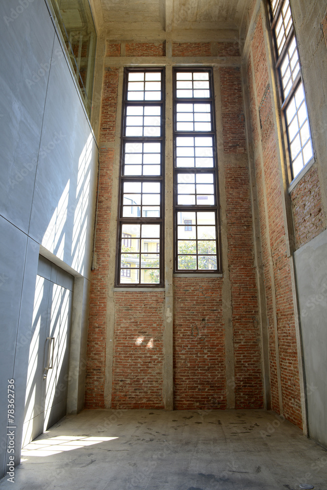 Sunlight from window on the cement walls and floor Sunlight from window on the cement walls and floor