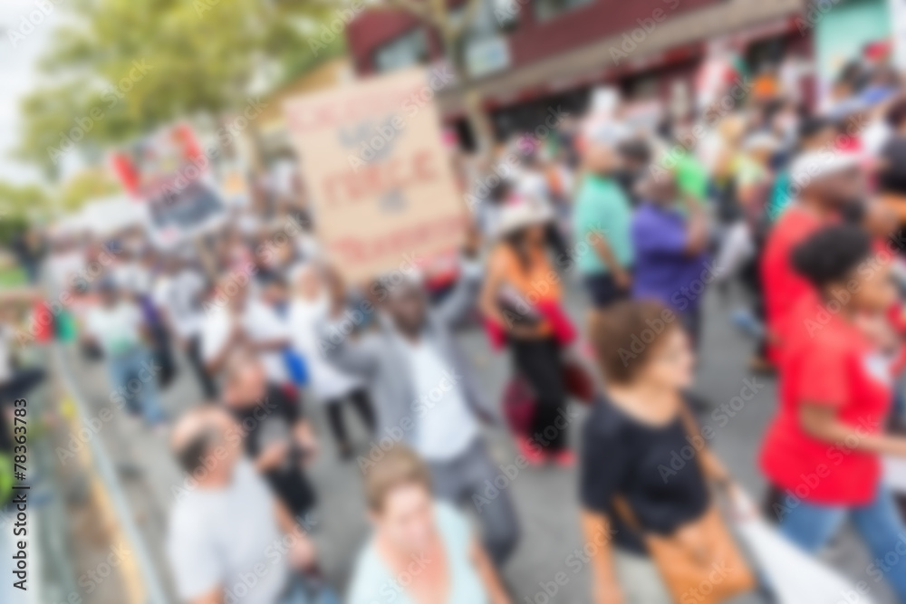 Thousands march in Staten Island. Blurred Background. - obrazy, fototapety, plakaty 
