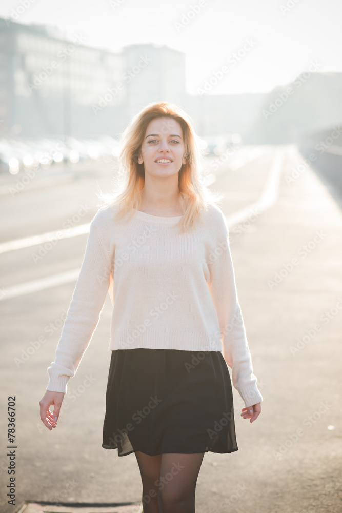 Fototapeta premium young beautiful blonde woman outdoor