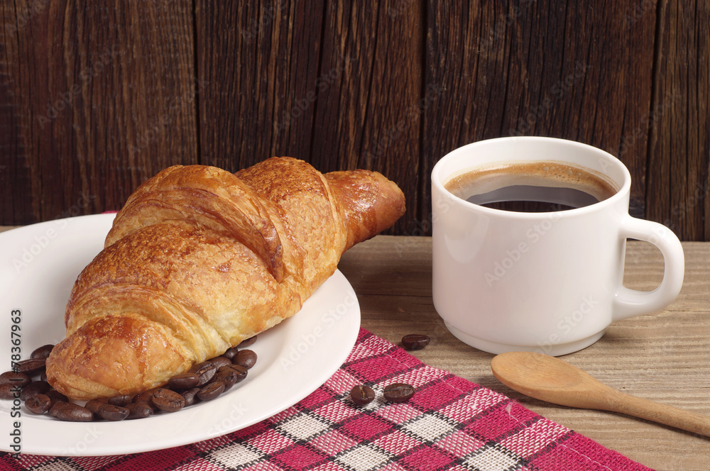 Breakfast with croissant and coffee Breakfast with croissant and coffee