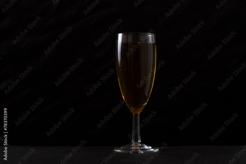 Glass is filled with alcohol Glass is filled with alcohol