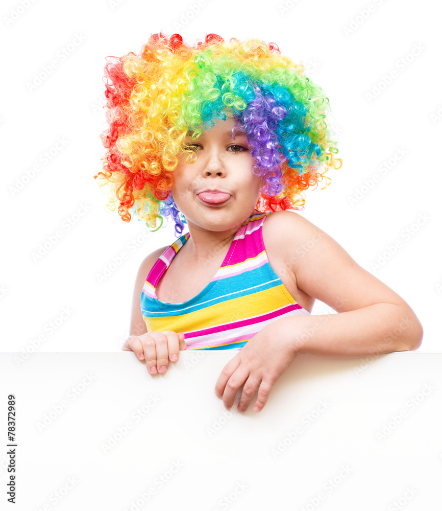 Girl in clown is holding blank banner Girl in clown is holding blank banner
