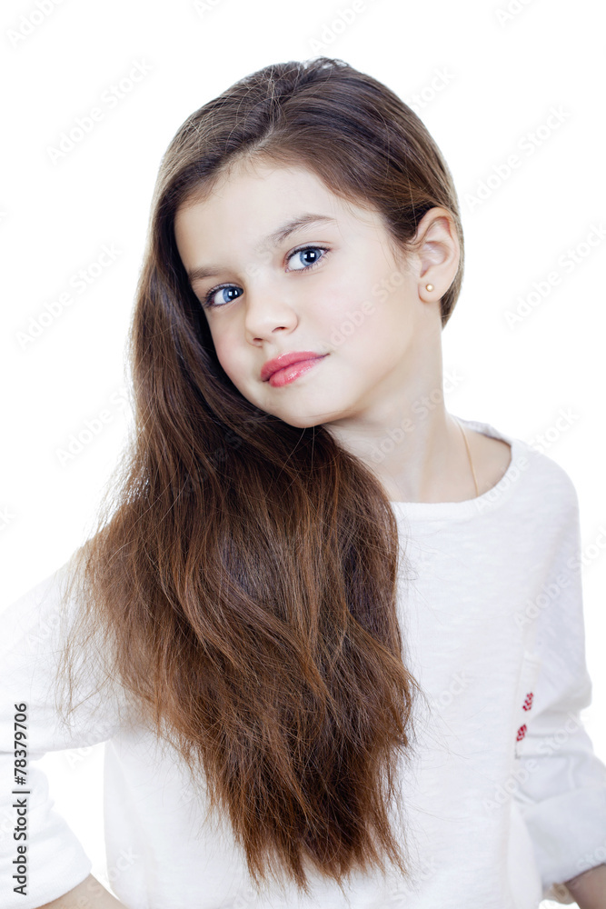 Portrait of a charming little girl smiling at camera Portrait of a charming little girl smiling at camera