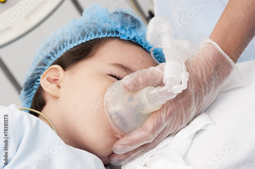 Child patient receiving artificial ventilation