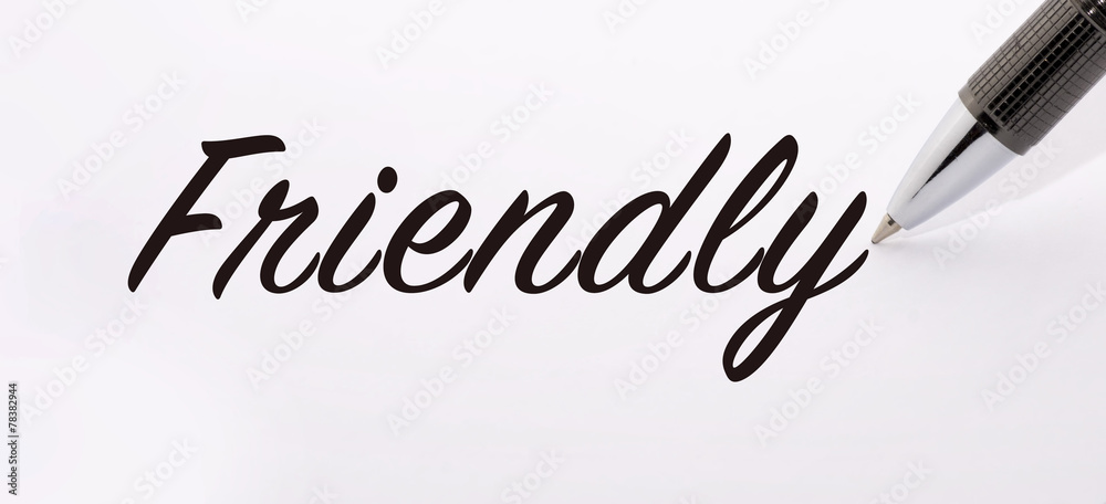Pen write friendly word on paper Stock Photo | Adobe Stock