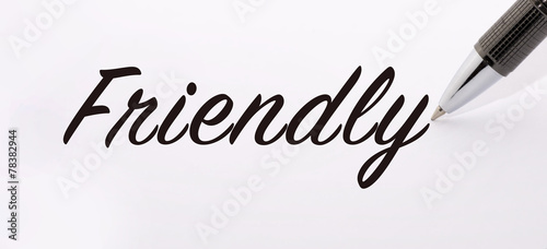 Pen write friendly word on paper Stock Photo