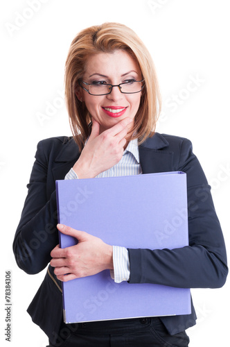 Business woman smiling and thinking