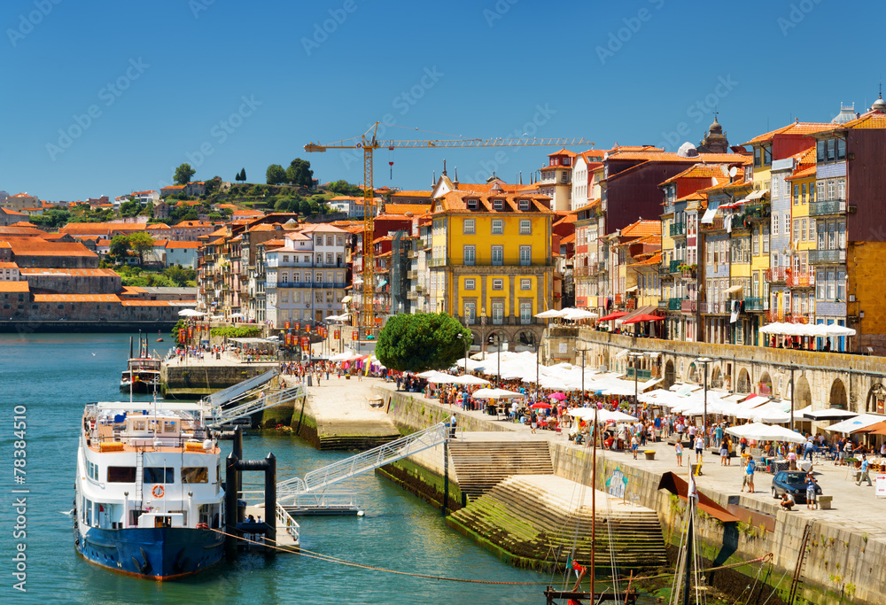 The Douro River and Colorful facades of old houses on embankment