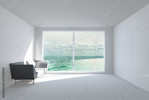 Fototapeta Naklejka Na Ścianę i Meble -  empty white room with sofa, window and view of ocean.