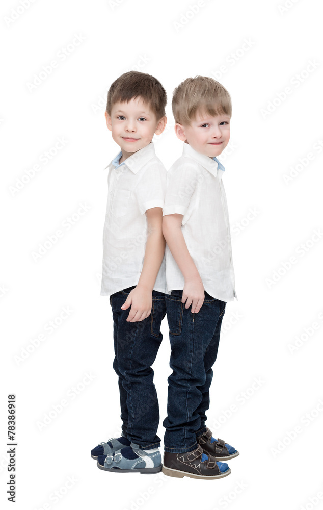 Four-year-old twins boys utmost, isolated on the white Four-year-old twins boys utmost, isolated on the white