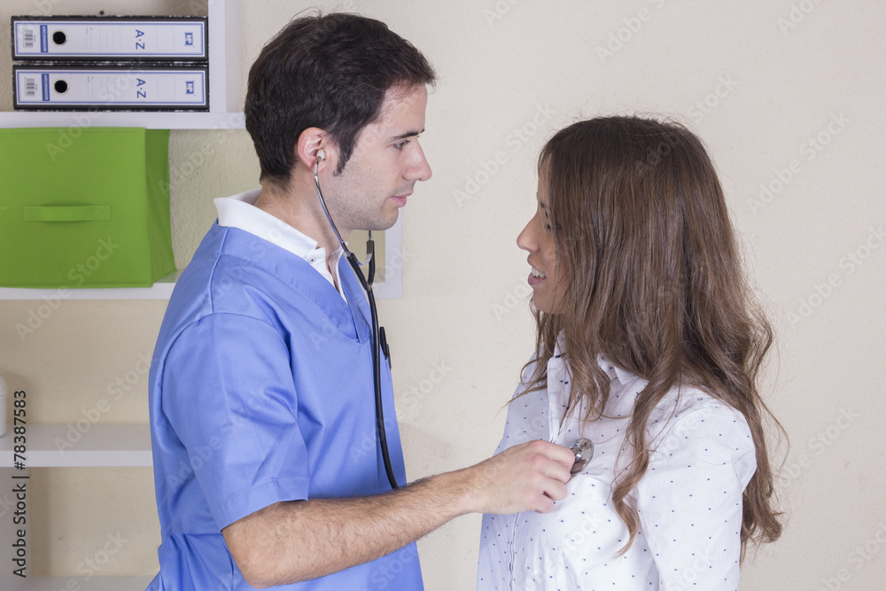 Handsome doctor male nurse working