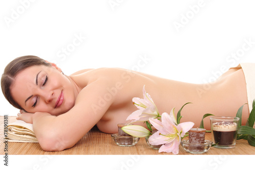 beautiful woman relaxing in spa. isolated on white
