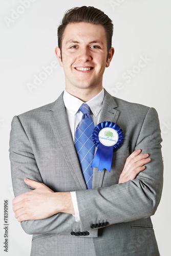 Portrait Of Conservative Politician Wearing Blue Rosette