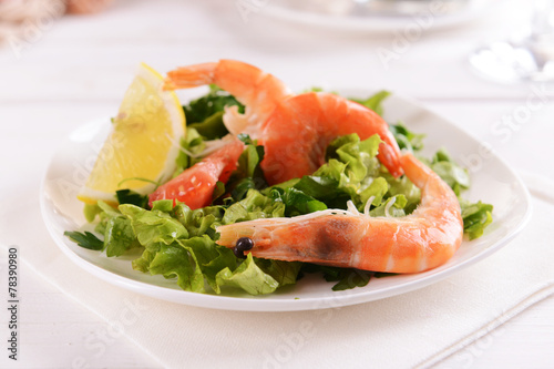 Tasty seafood on plate on table close-up