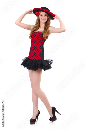Young redhead girl in polka dot dress and sombrero isolated on