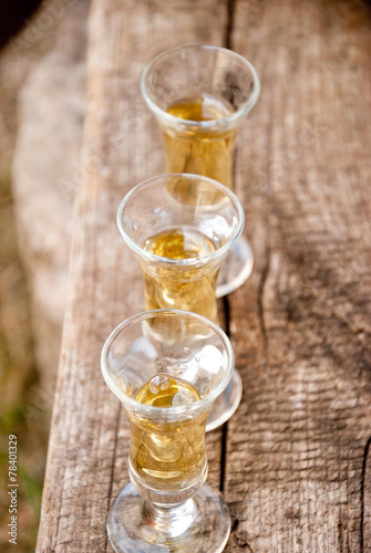 Small glasses filled with rakija