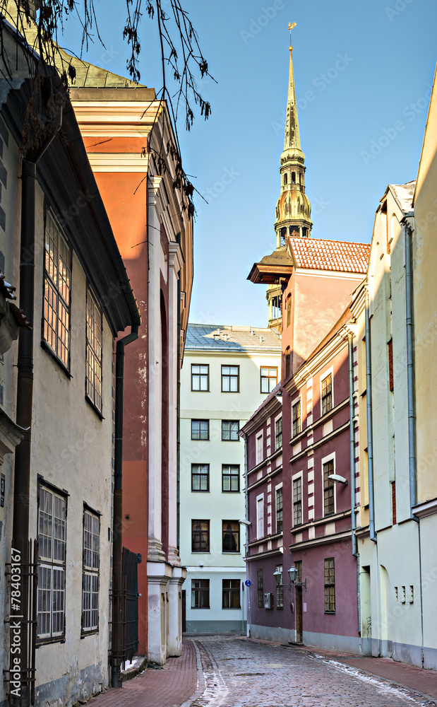 Narrow medieval street in old Riga city, Latvia, Europe