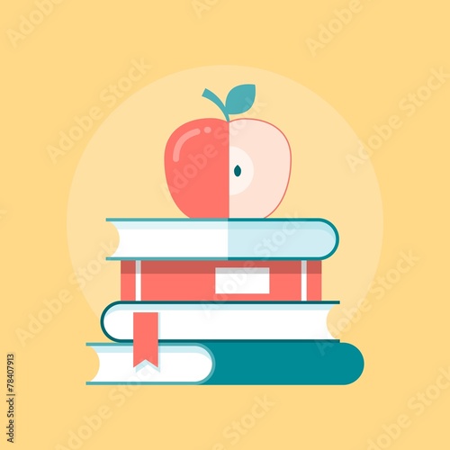 stack of books with apple on top