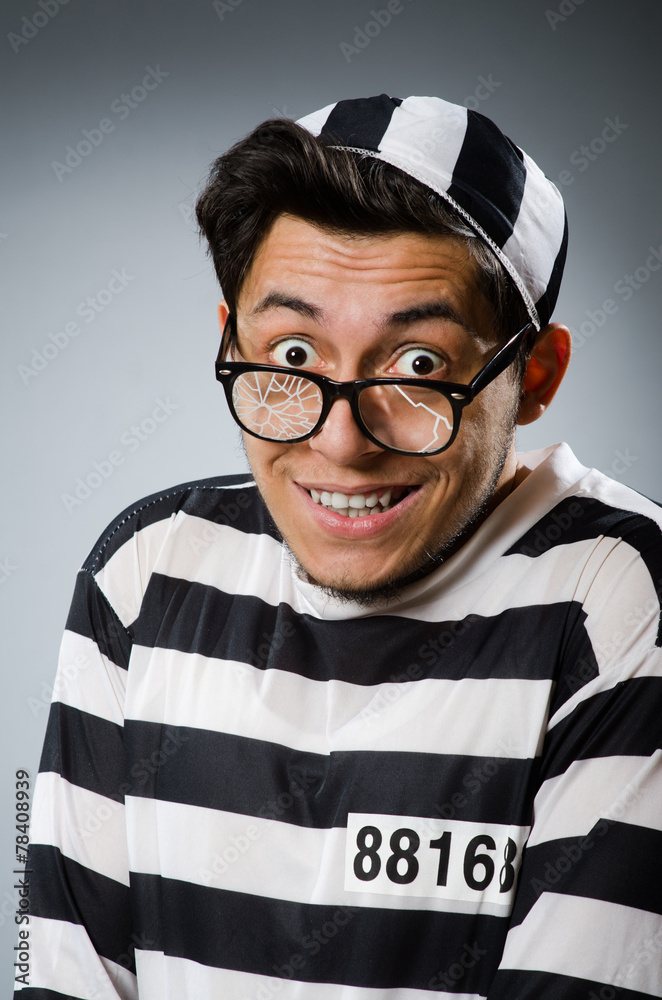 Prison inmate in funny concept Prison inmate in funny concept