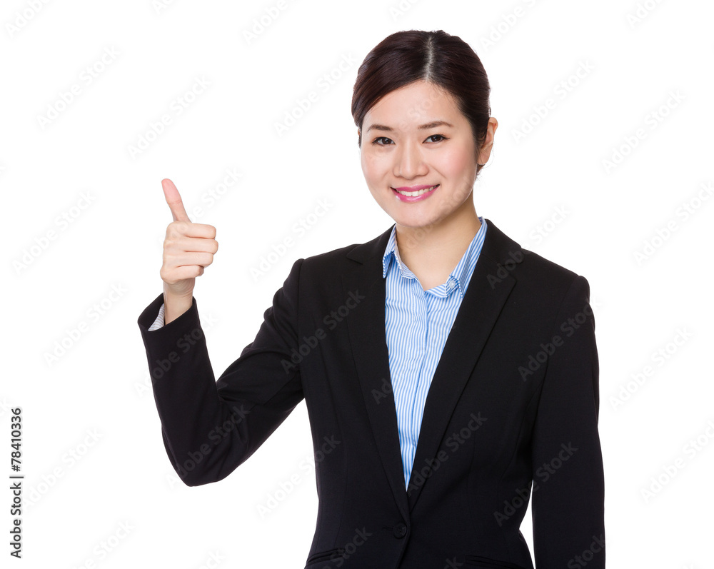 Businesswoman with thumb up