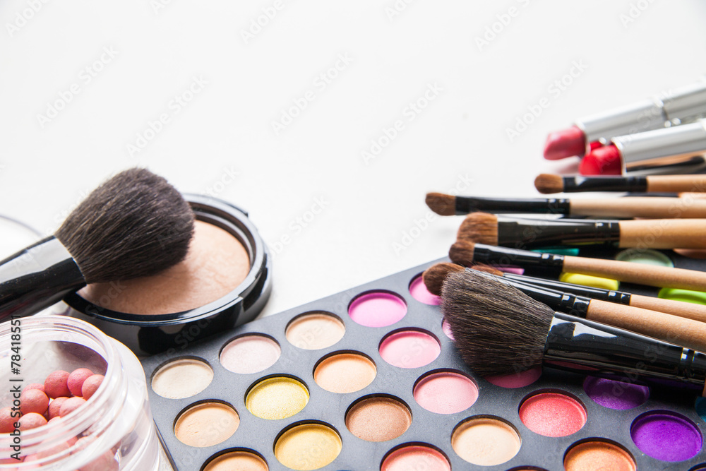 Make-up multicolored palette, brushes and cosmetics. Make-up multicolored palette, brushes and cosmetics.