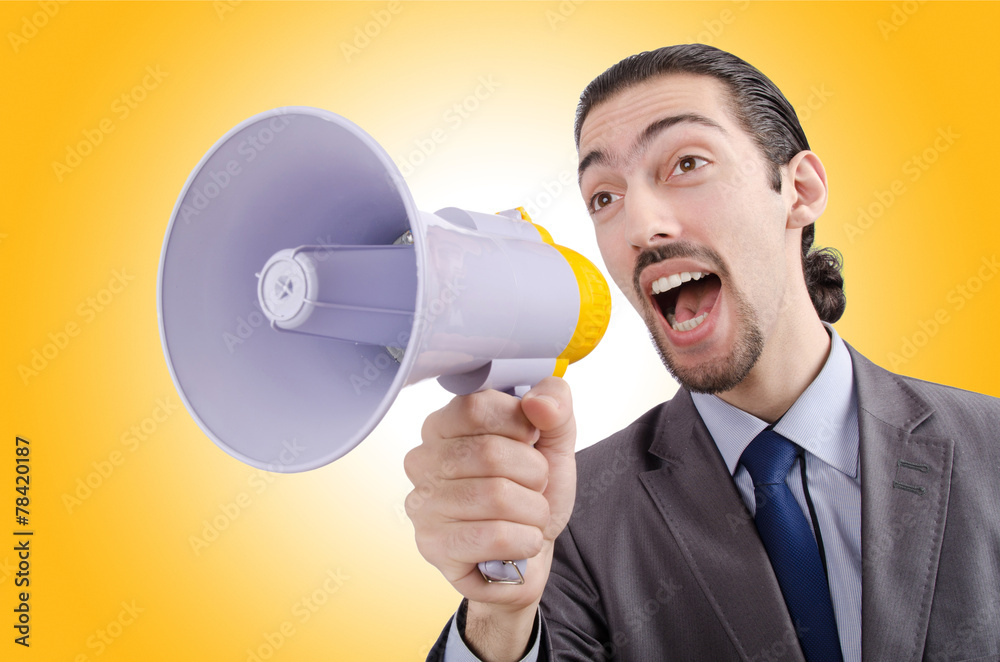 Man shouting and yelling with loudspeaker Man shouting and yelling with loudspeaker