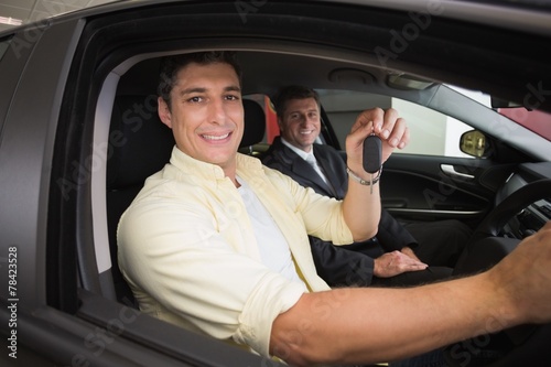 Happy male driver at the wheel sitting in his car © WavebreakmediaMicro