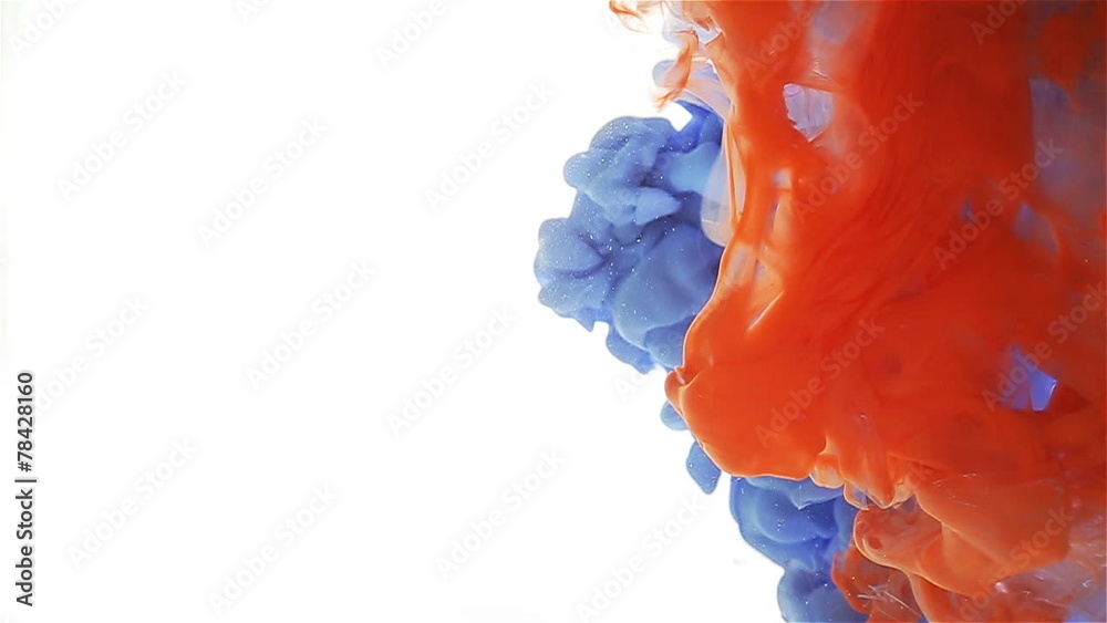 blue and orange color drop circulating, forming a color spread.