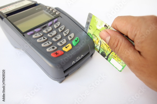 Paying credit card on White Background. photo