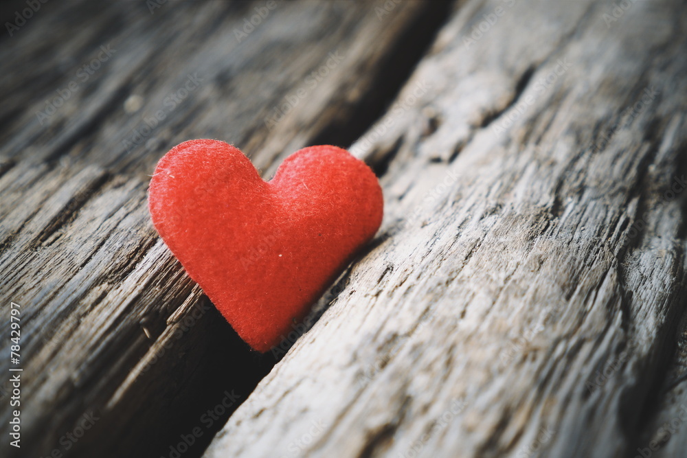 Fototapeta premium red heart on the wood texture
