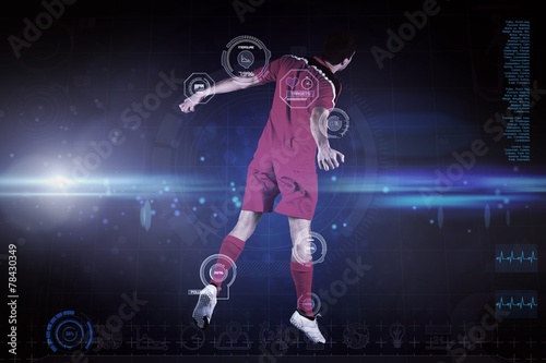 Composite image of fit football player jumping up