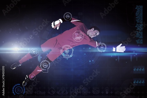 Composite image of fit goal keeper jumping up © WavebreakmediaMicro