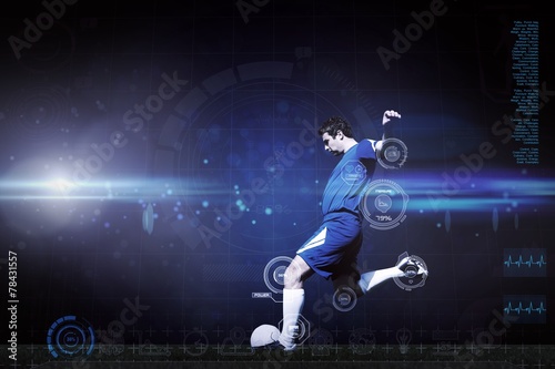 Composite image of football player kicking ball