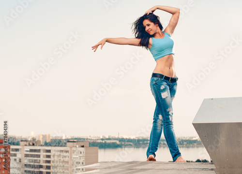 Fototapeta Naklejka Na Ścianę i Meble -  Happy woman dance