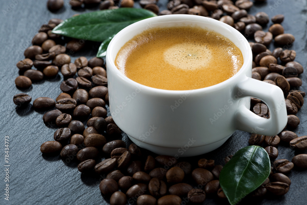 cup of espresso on coffee beans background, selective focus cup of espresso on coffee beans background, selective focus