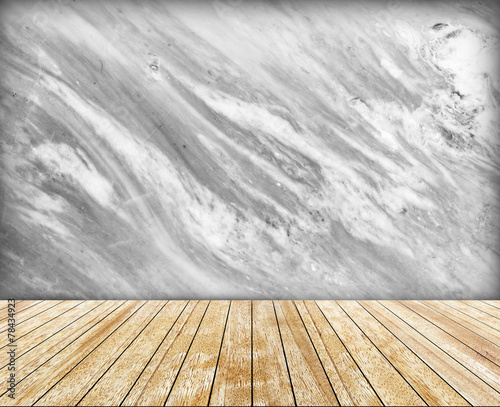 Backdrop marble wall and slabs arranged in perspective.