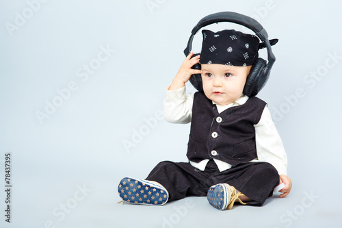 baby with headphone © producer