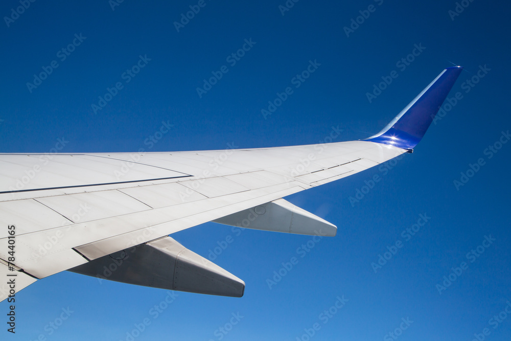 Obraz premium Aerial view of sky from aircraft window.