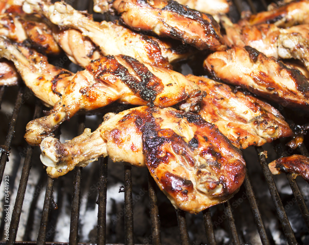 Grilled chicken Leg on the grill