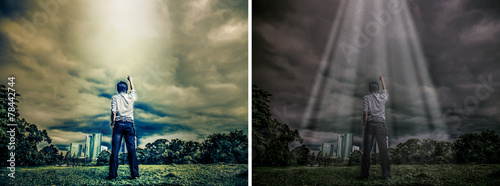 Rough illustration of a man challenging the sky with light shine photo