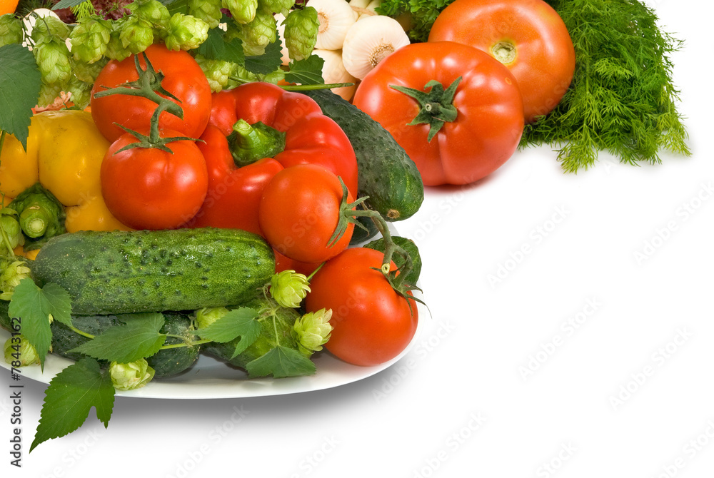 vegetables on the plate on a white background closeup