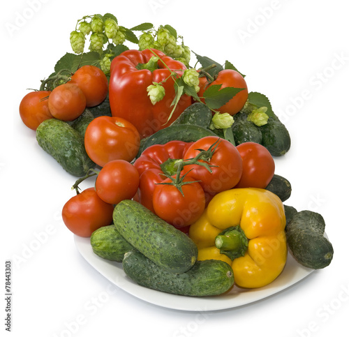 vegetables on the plate on white background