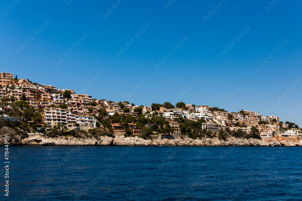 Apartment buildings by Mediterranean Sea.  view of Mallorca coas