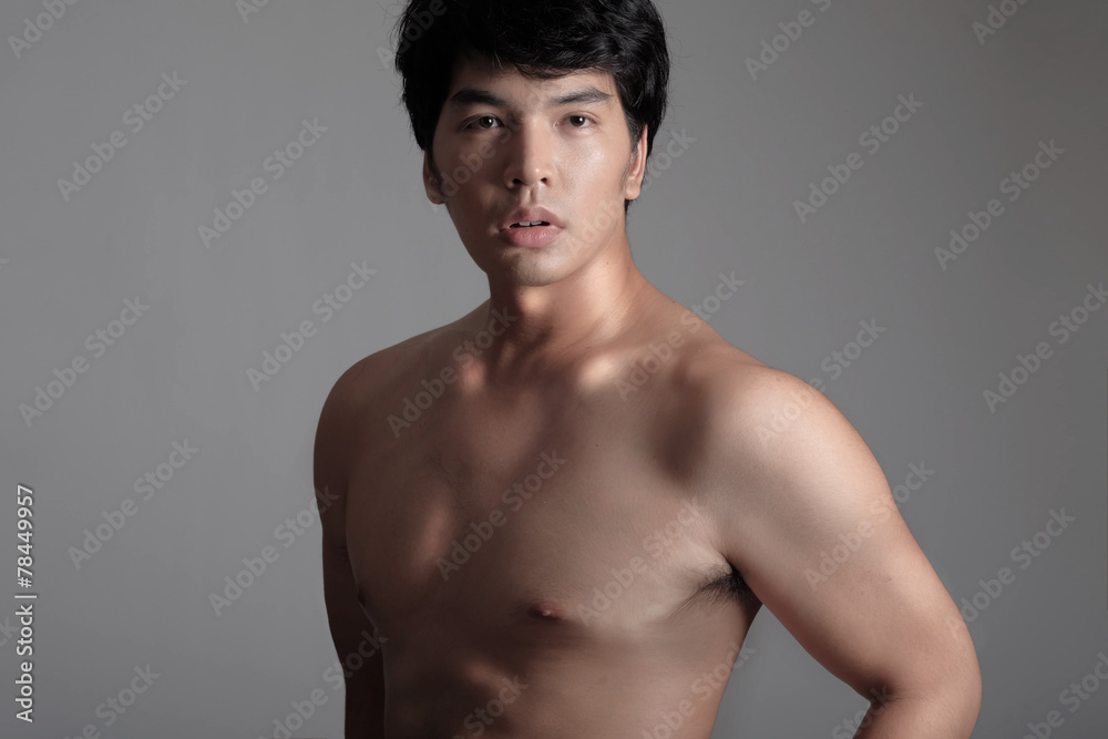 Fototapeta premium Portrait of Handsome Asian male model in Shirtless