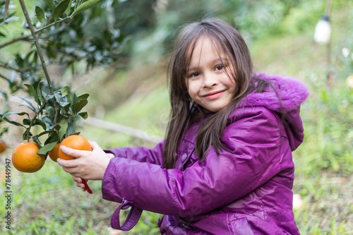 Child on Orange Farm