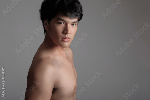 Portrait of Handsome Asian male model in Shirtless